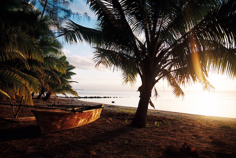 The sun setting on the island of Aitutaki